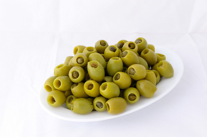 Green stuffed olives with caper