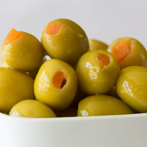 Green stuffed olives with carrot