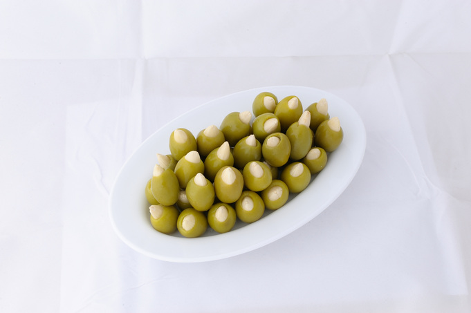 Green stuffed olives with almond
