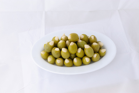 Green stuffed olives with garlic